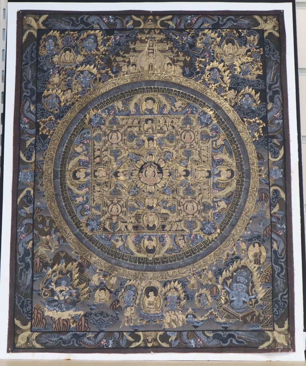 A Tibetan painted and gilt fabric thangka, 48 x 38cm